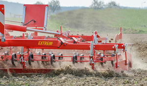 mounted field cultivator / with roller / 3-point hitch / spring tine