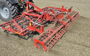 mounted field cultivator / with roller / 3-point hitch / spring tine