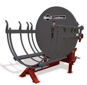 tractor-mounted bundling machine / log