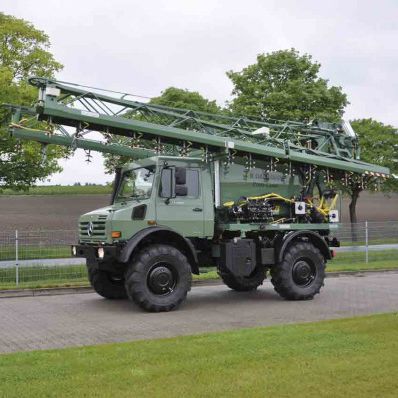 Pulverizador remolcado - Unimog - Herbert Dammann GmbH Pflanzenschutztechnik - para grandes cultivos / con brazo plegado / neumático