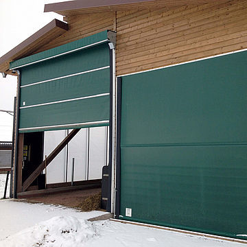 Puerta enrollable - Lubratec® - HUESKER Synthetic GmbH - para criadero / de granero
