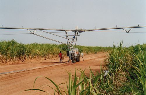 Pivot de riego alimentado por tubo - RAIN LINER VV - 2IE INTERNATIONAL - con 2 ruedas / con 2 laterales / por surcos