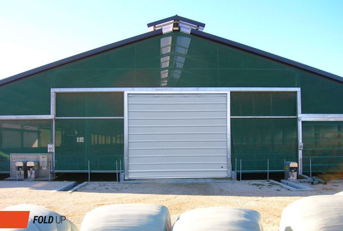 Puerta plegable - FOLD-UP - Giesse S.p.A. - para criadero / para invernadero / para edificio de almacenamiento