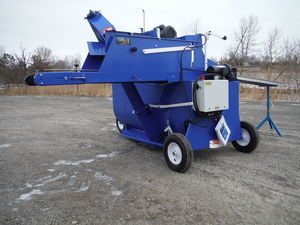décompacteur de big bale avec distribution