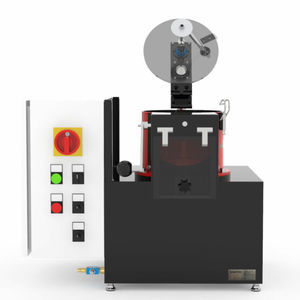 machine de traitement de semences avec système d'enrobage