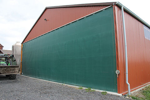 Porte coulissante - Lubratec® - HUESKER Synthetic GmbH - pour bâtiment de stockage / de sécurité / brise-vent