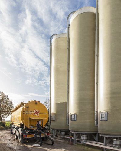 Silo pour liquides - VBS - M.I.P. NV - Mertens Industrial Products - en acier galvanisé / rond / à fond plat