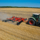 déchaumeur à disques semi-porté / 2 sections / avec rouleau / avec roues de contrôle