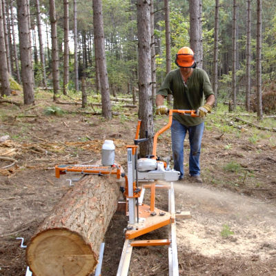 Band sawmill PortaMill PM14 Norwood Sawmills USA Inc. horizontal stationary with belt conveyor