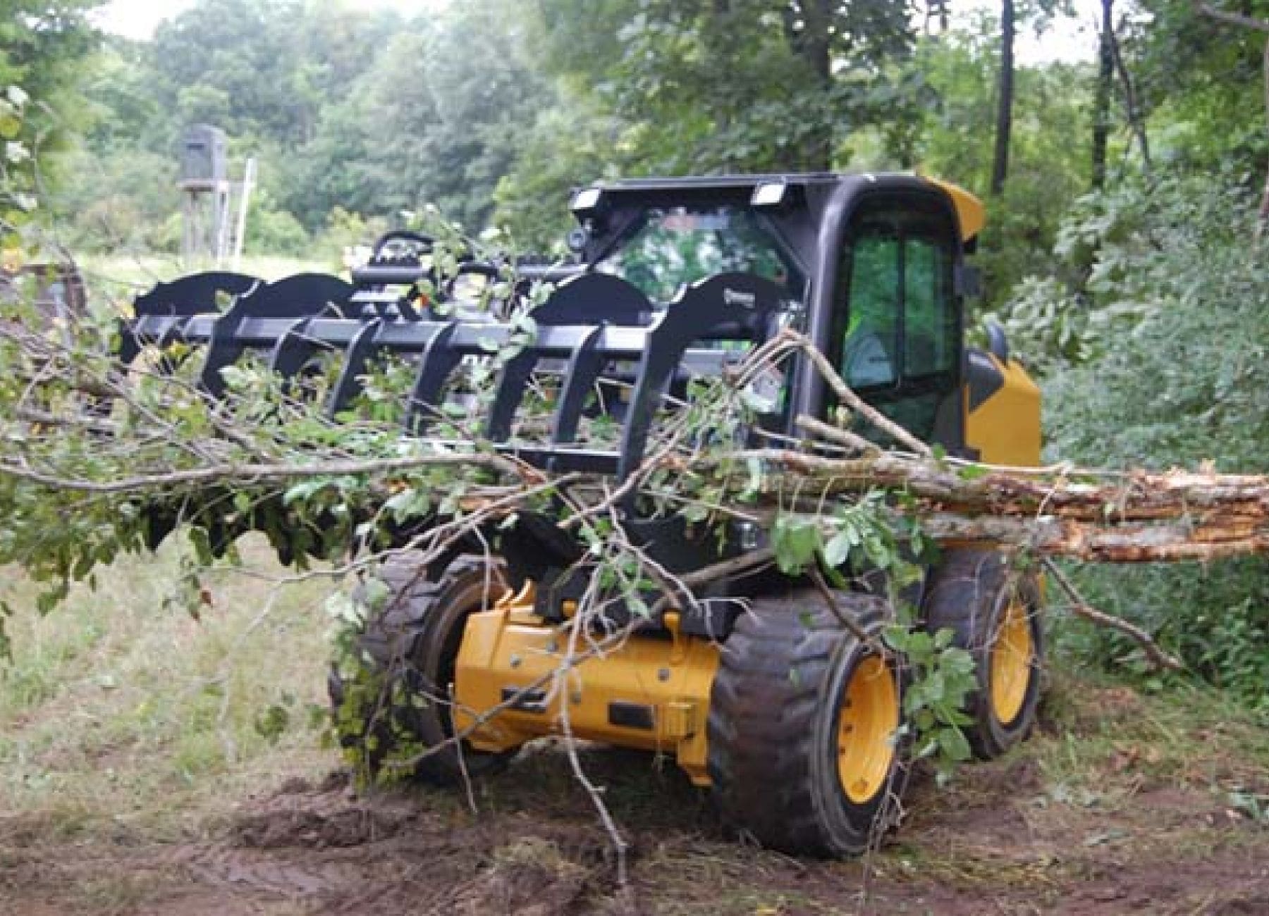 Agricultural log grapple paladin attachments for mini excavators