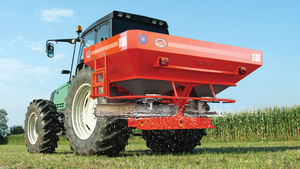 tractor-mounted fertilizer spreader