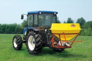 tractor-mounted fertilizer spreader
