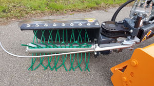 weeder tool carrier arm