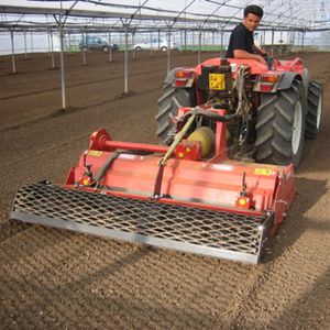 stone burier with hydraulic adjustment