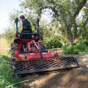 stone burier with hydraulic adjustment