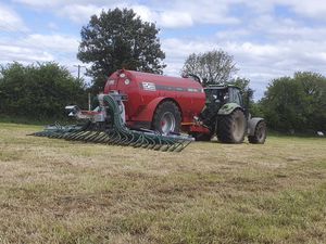 sludge spreading boom