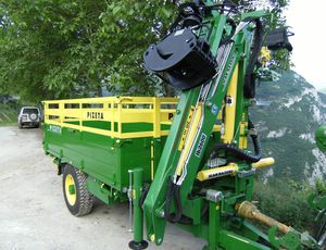 trailer-mounted log loader