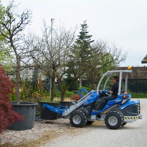 skid steer loader tree spade