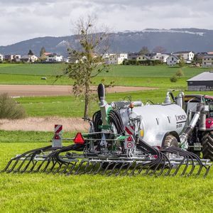trailing shoe spreader boom