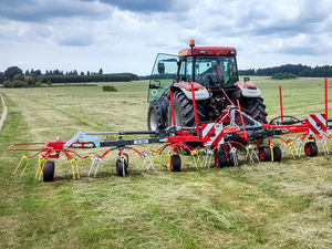 mounted tedder