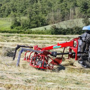 mounted tedder