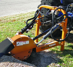 tractor-mounted stump grinder