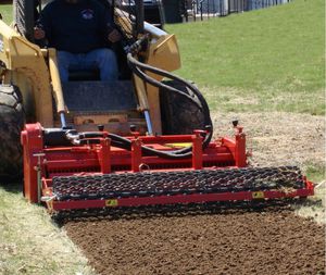 stone burier with hydraulic adjustment