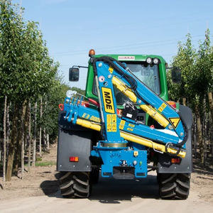 tractor-mounted log loader