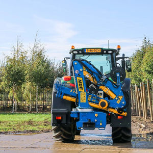 tractor-mounted log loader
