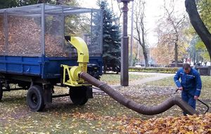 tractor-mounted debris vacuum