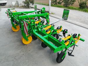 tractor-mounted row crop cultivator