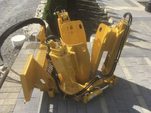 skid steer loader tree spade