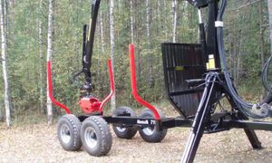 trailer-mounted log loader