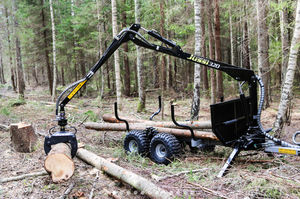 trailer-mounted log loader