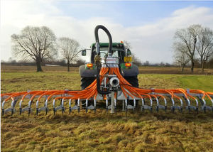 sludge spreader boom