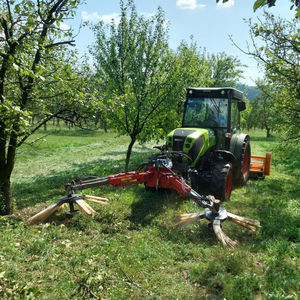 mulching tool carrier arm