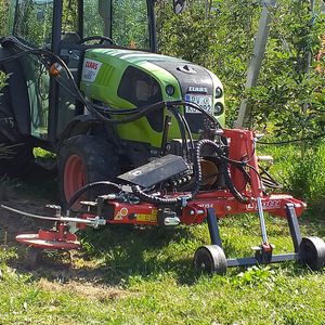 multifunction tool carrier arm