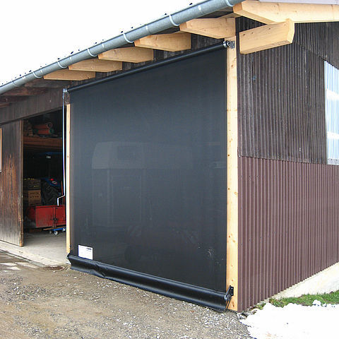 Door for livestock buildings - Lubratec® - HUESKER Synthetic GmbH - barn / for storage building / roll up