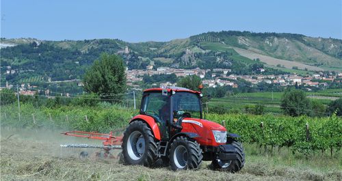 Power shuttle tractor - X4 series - McCormick USA - with cab / 3-point hitch