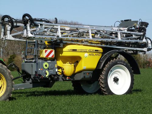 Towed sprayer - HYBRIDE  - Arland - folding arms