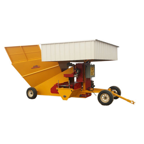 Automatic tray filler Super Ellis Products Inc Mitchell