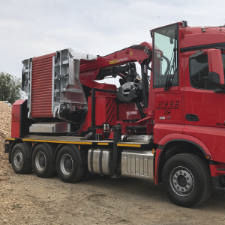 Truck-mounted wood chipper - 12 NMV - MUSMAX - with combustion engine / with crane / hydraulic supply