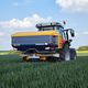 tractor-mounted fertilizer spreader / solid / wide / with GPS