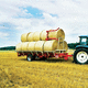 round bale loader / trailed / self-unloading