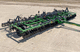 towed disc harrow / 2-section / with roller / folding