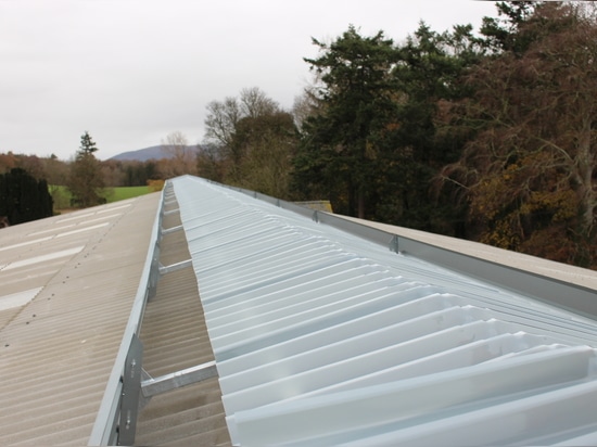 Why does ridge ventilation matter in livestock buildings?