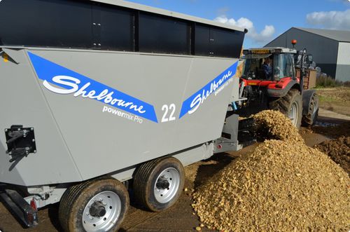 Miscelatore a vite verticale - Powermix Express Series - Shelbourne Reynolds Engineering - trainato / con scarico frontale / a 2 coclee