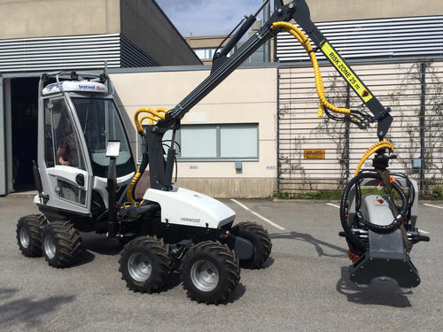 Abbattitrice forestale gommata - Forest Master Turb - Usewood Forest Tec Oy - con gru