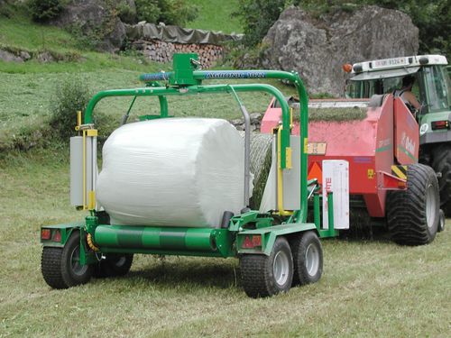 Empacotadora de fardos em linha - 1022,1025 - AGRONIC OY - para fardos redondos / automática / de arrasto