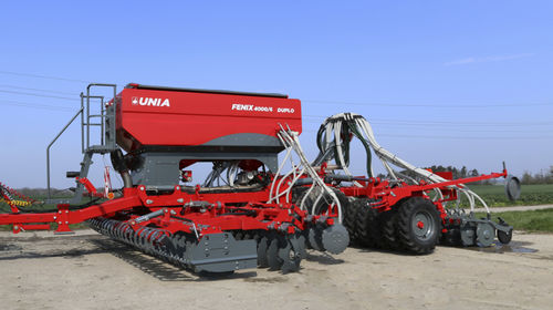 Semeadora de fluxo contínuo pneumática - FENIX 3000/6; FENIX 4000/6 DUPLO - Unia - de disco / de hastes rígidas / montada em trator